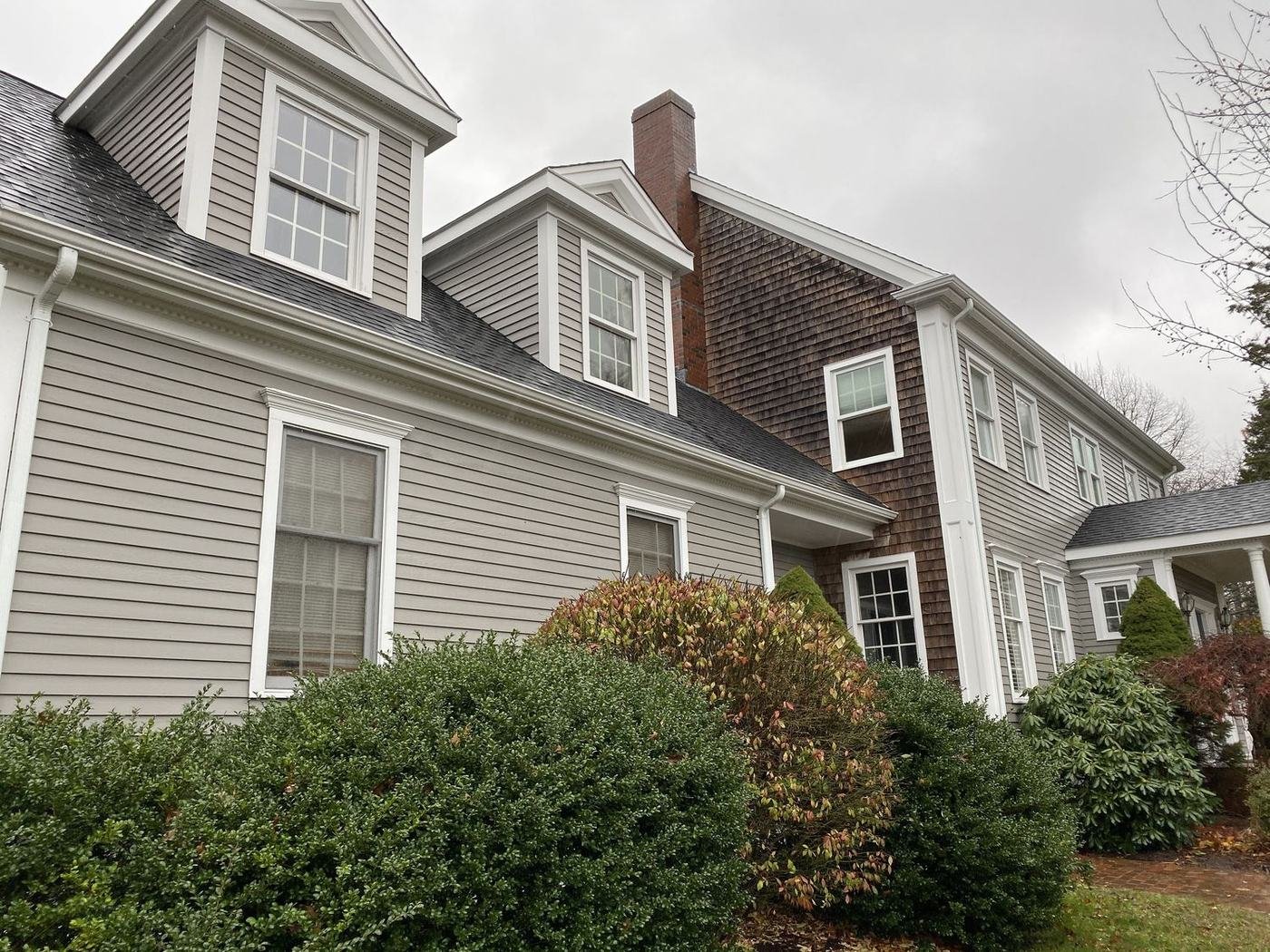 Freshly painted classic New England colonial home exterior in Massachusetts